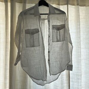 White shirt. Don’t remember brand